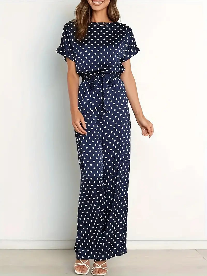 Combinaison femme chic à imprimé pois et coupe moderne