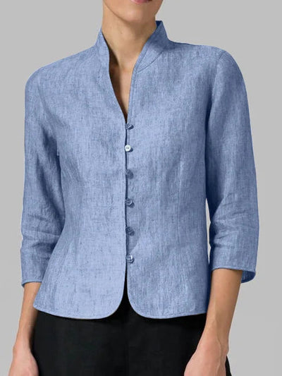 Blouse femme avec col montant élégant et boutons décoratifs