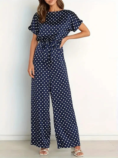 Combinaison femme chic à imprimé pois et coupe moderne