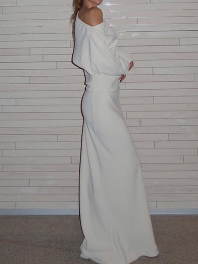 Dani | Robe longue asymétrique à épaules dénudées et manches longues