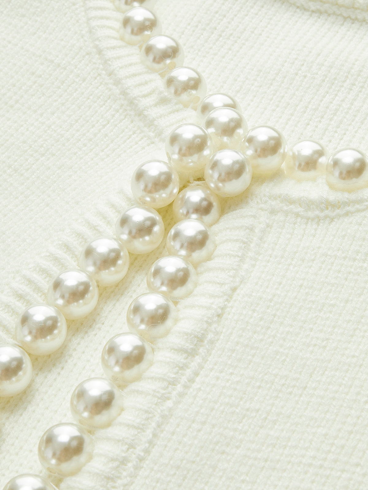 Wena | Cardigan à ourlet déchiré et bordure perlée