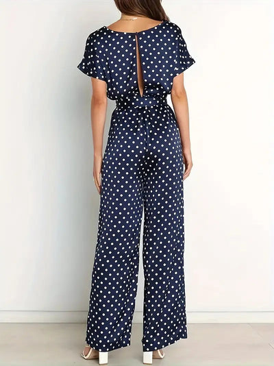 Combinaison femme chic à imprimé pois et coupe moderne